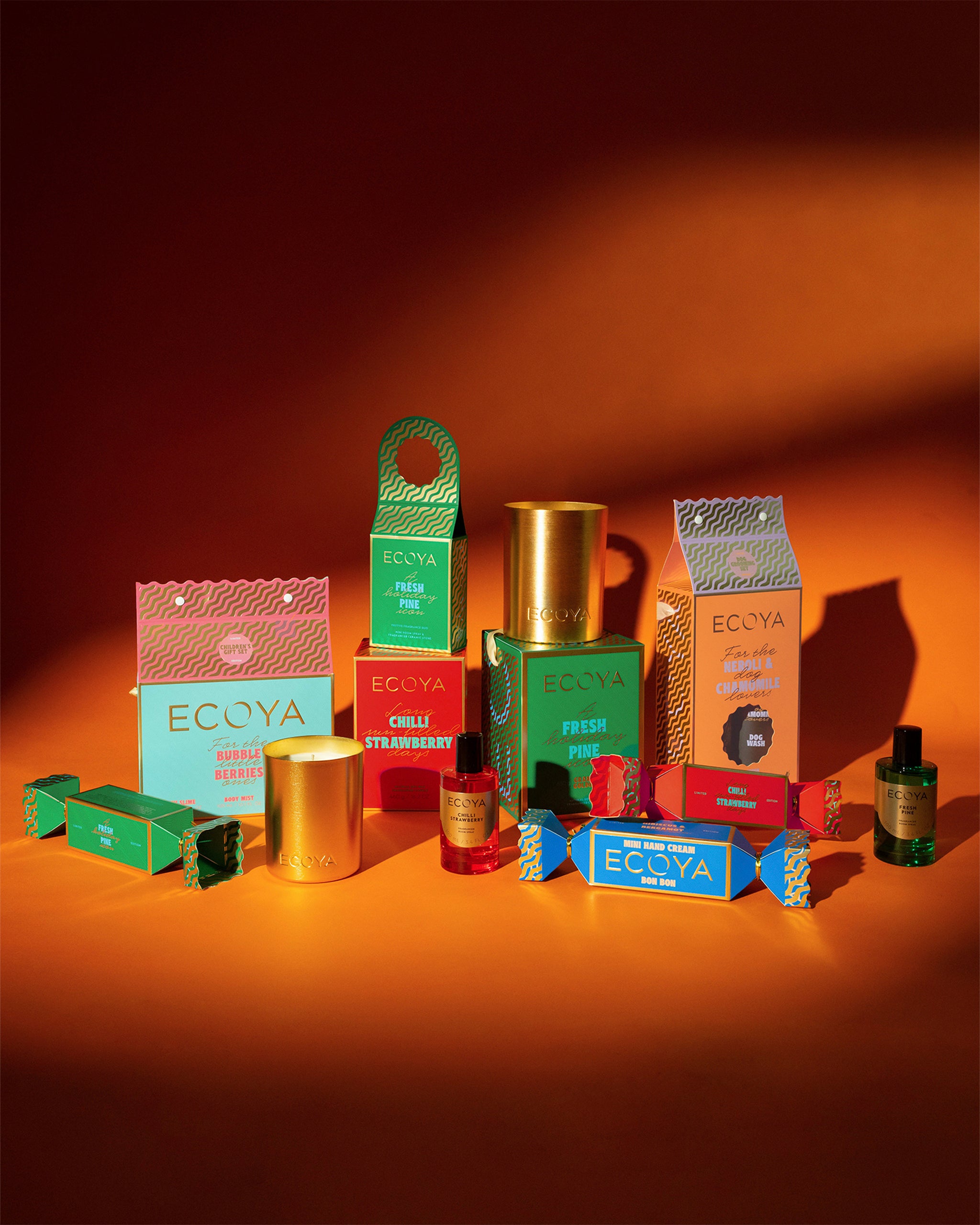 Collection of ECCYA products on an orange background