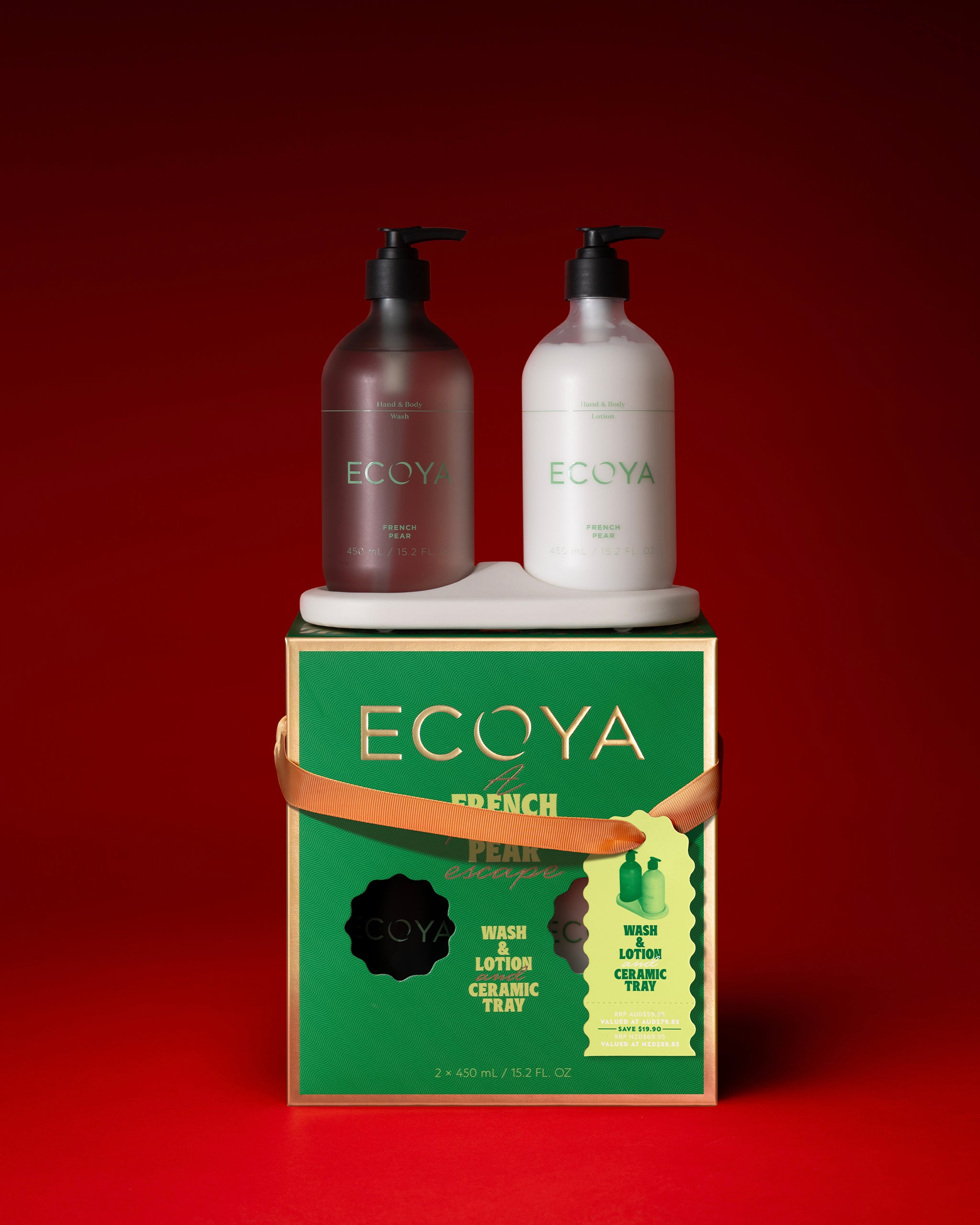 Two ECOYA bottles on a green box against a red background