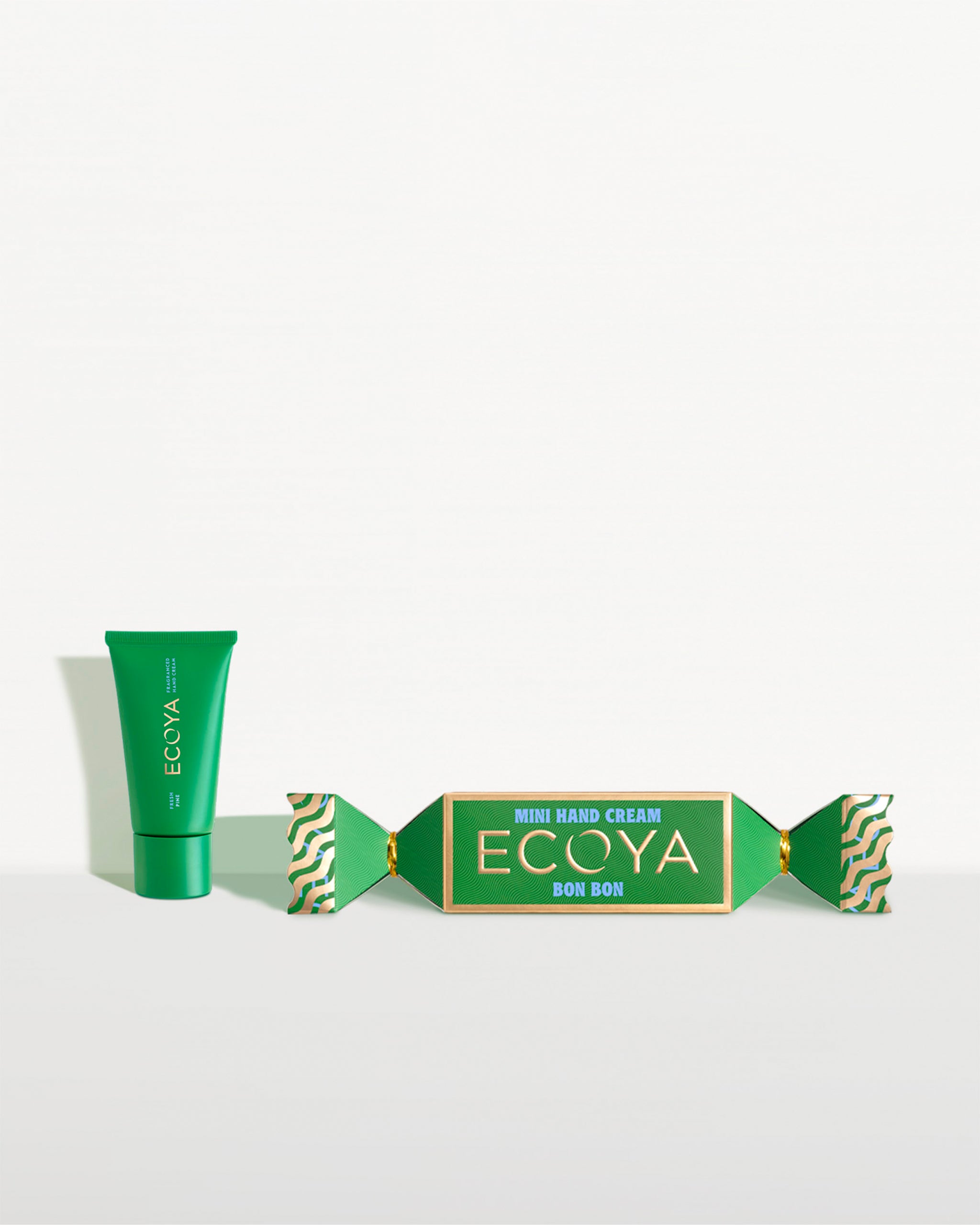 Ecoya hand cream tube and in bon bon packaging on a white background