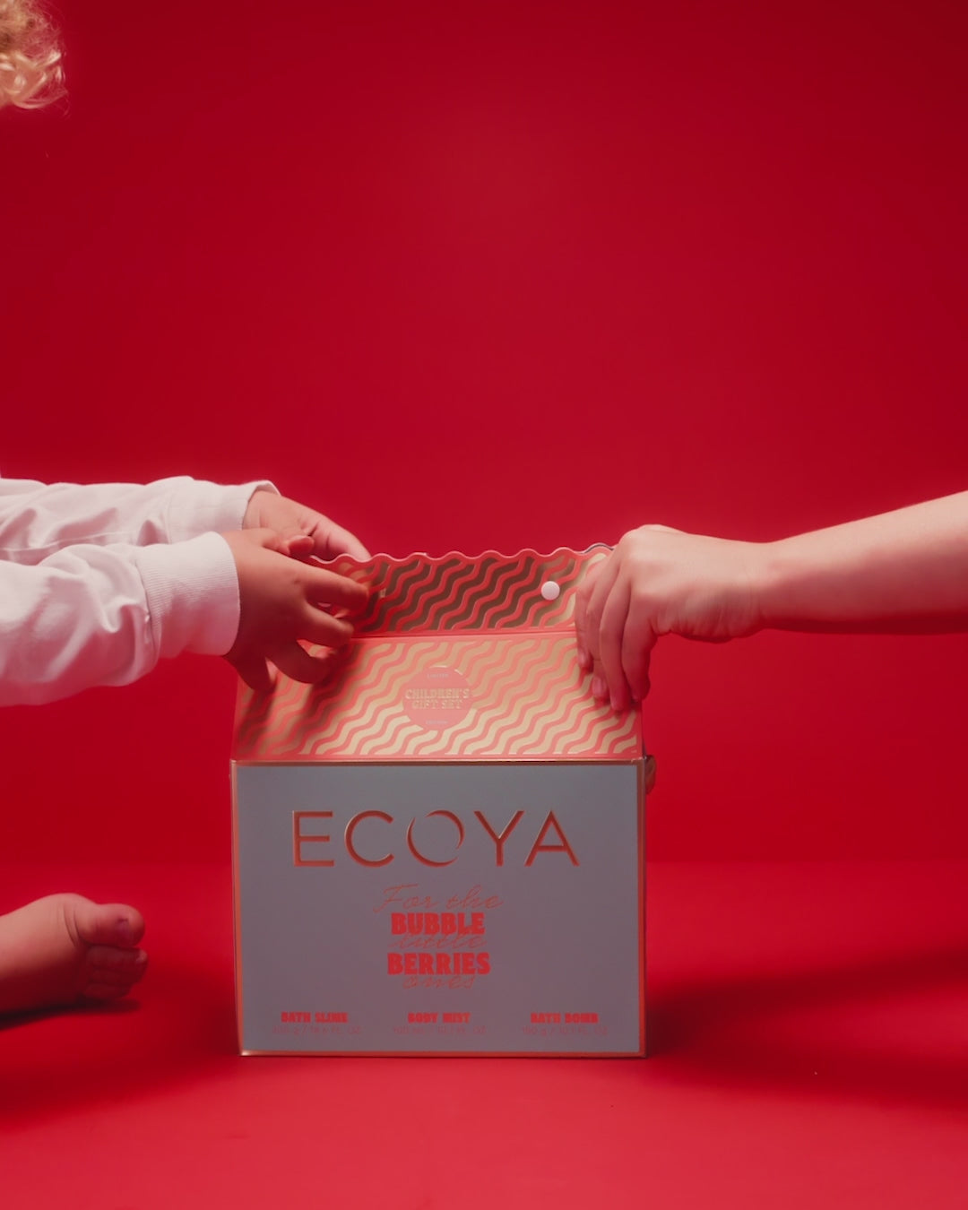 cute kids opening bath bomb gift box