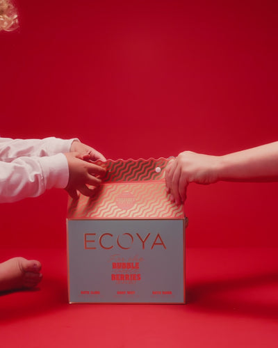 cute kids opening bath bomb gift box